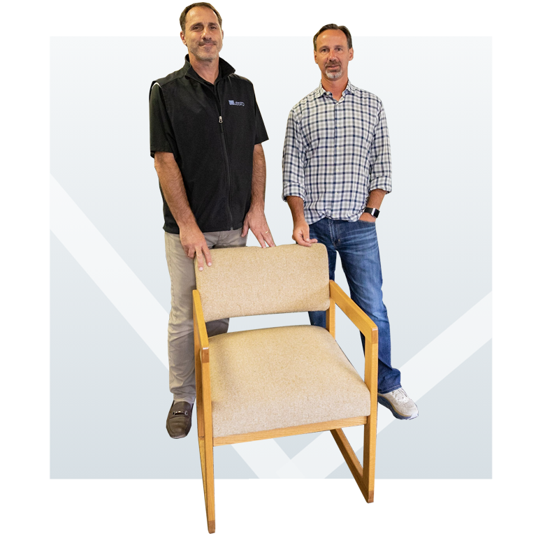 lesro-brothers-with-chair.png